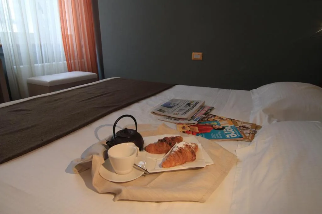 Camera Quadrupla — Hotel Metrò