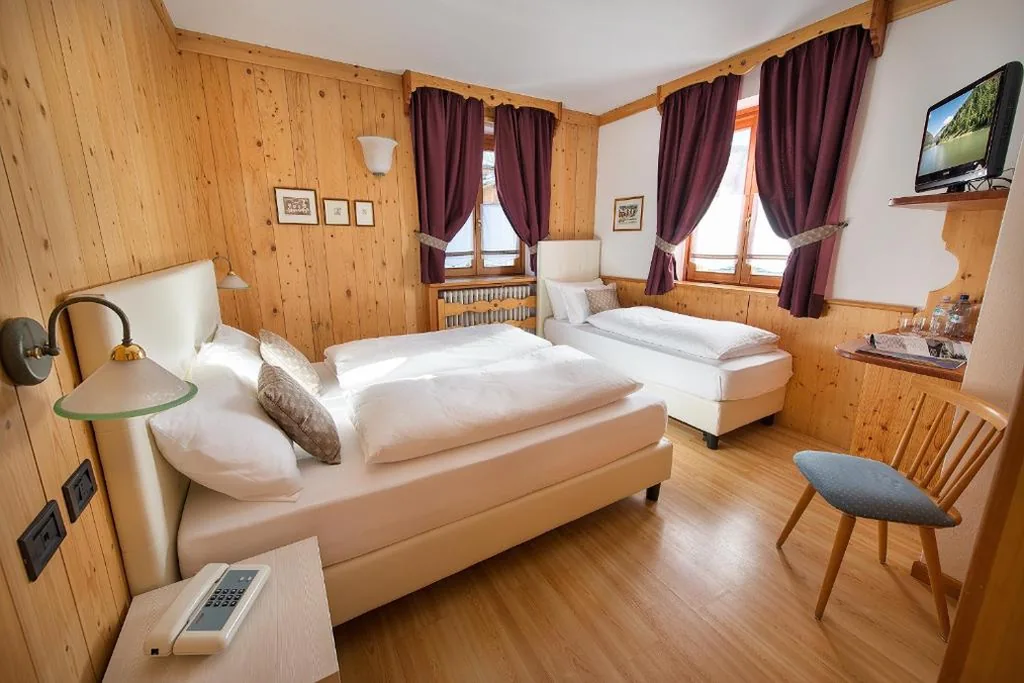 Quadruple Room — Hotel Posta