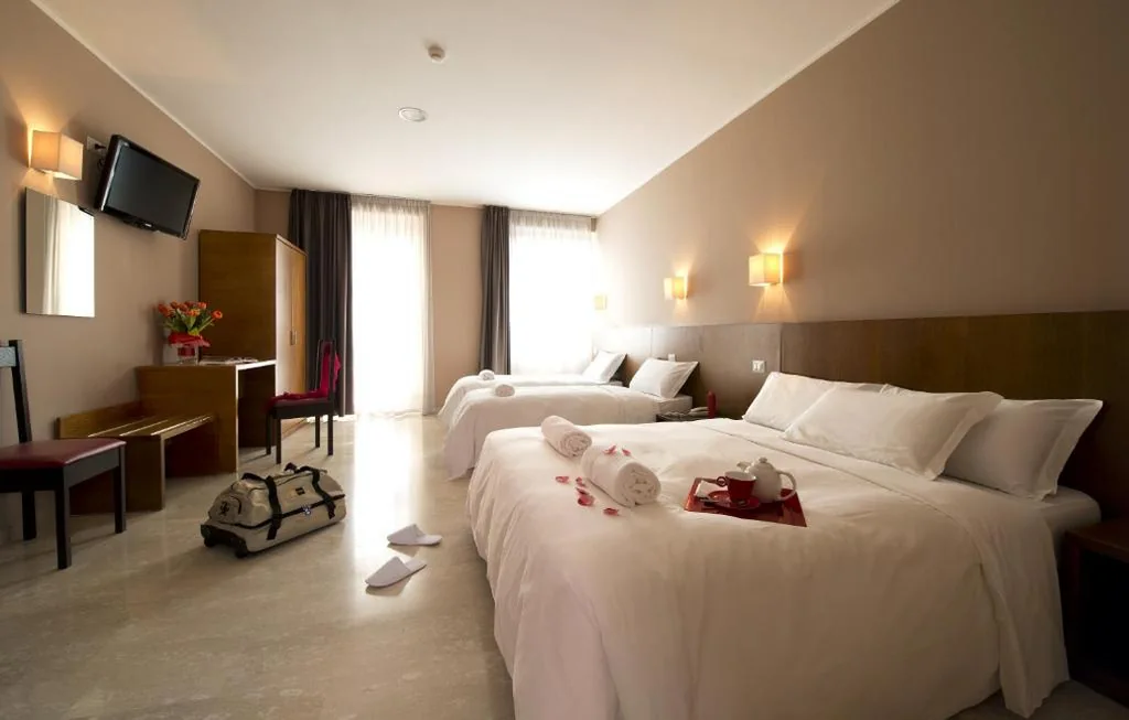 Quadruple Room — Oasi Village Hotel