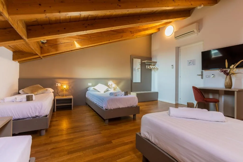 Premium Quadruple Room with Single Beds — Martini Suite