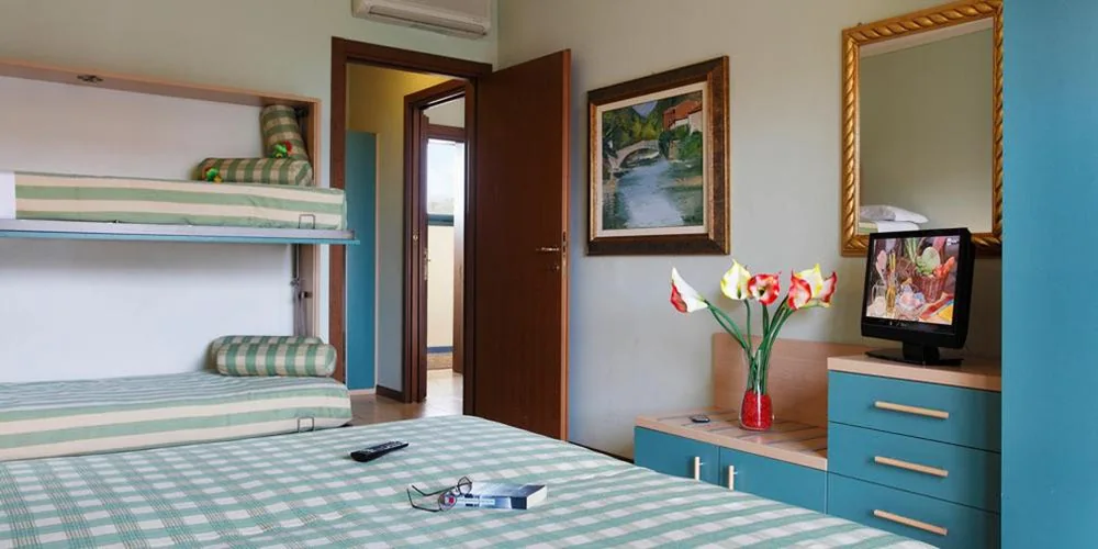 Quadruple Room — Residence Spiaggia D’Oro
