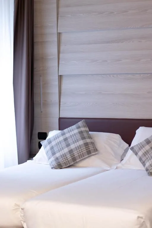 Superior Quadruple Room — Duomo Hotel & Apartments
