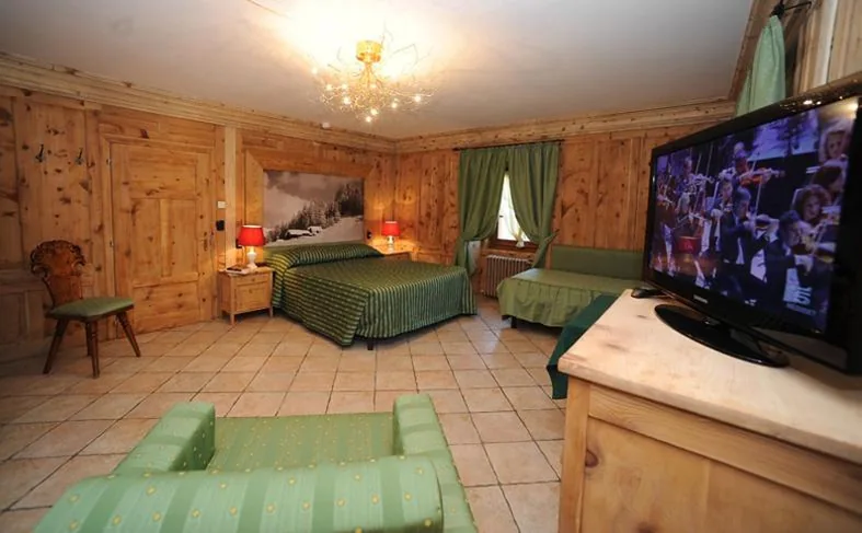 Superior Quadruple Room — Hotel Alpina