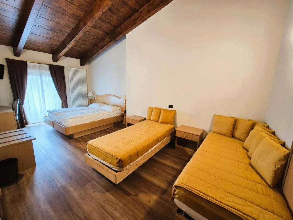 Superior Quadruple Room — Hotel Angelica