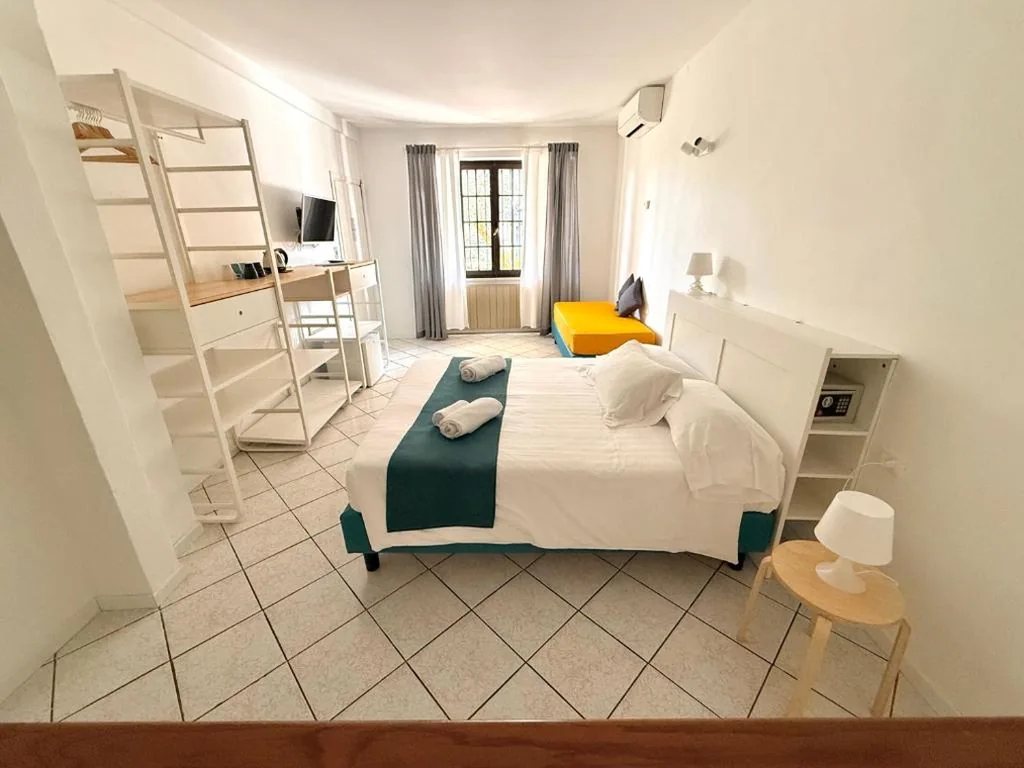 Quintuple Room with Garden View — Albergo Vittoria