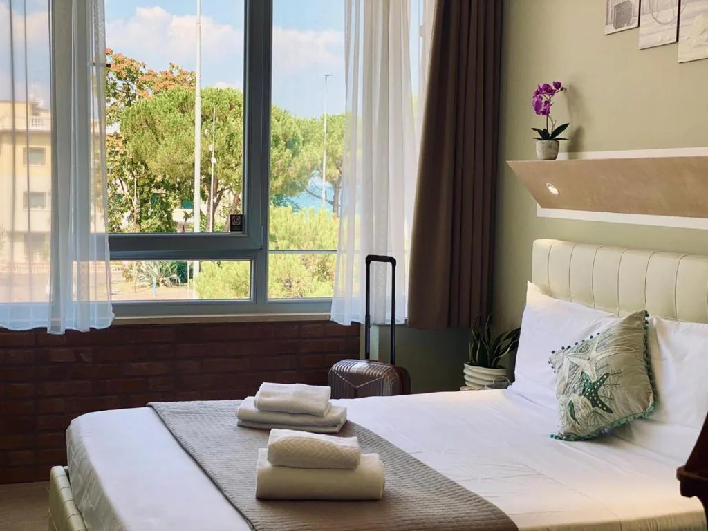 Basic Triple Room — Atico Hotel