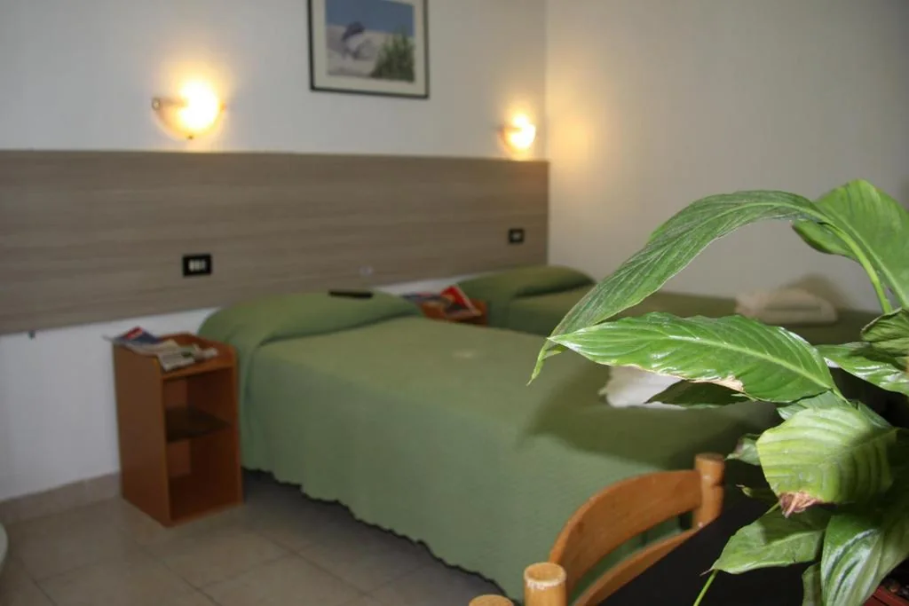 Basic Triple Room with Shared Bathroom — Hotel Adelchi