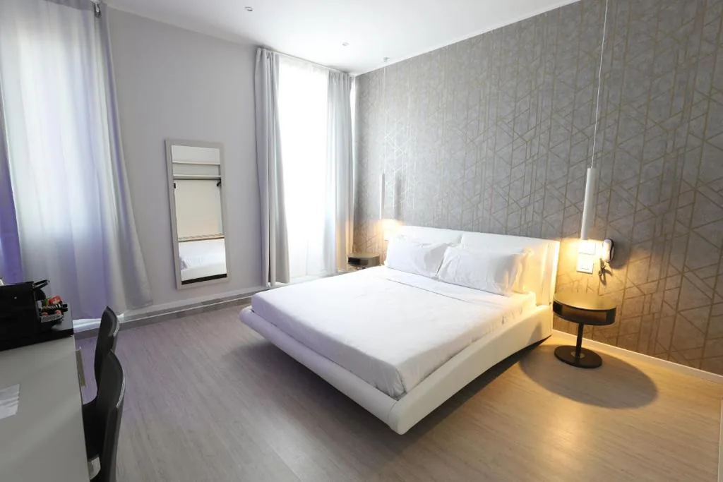 Triple Room — Cadorna Luxury Hotel