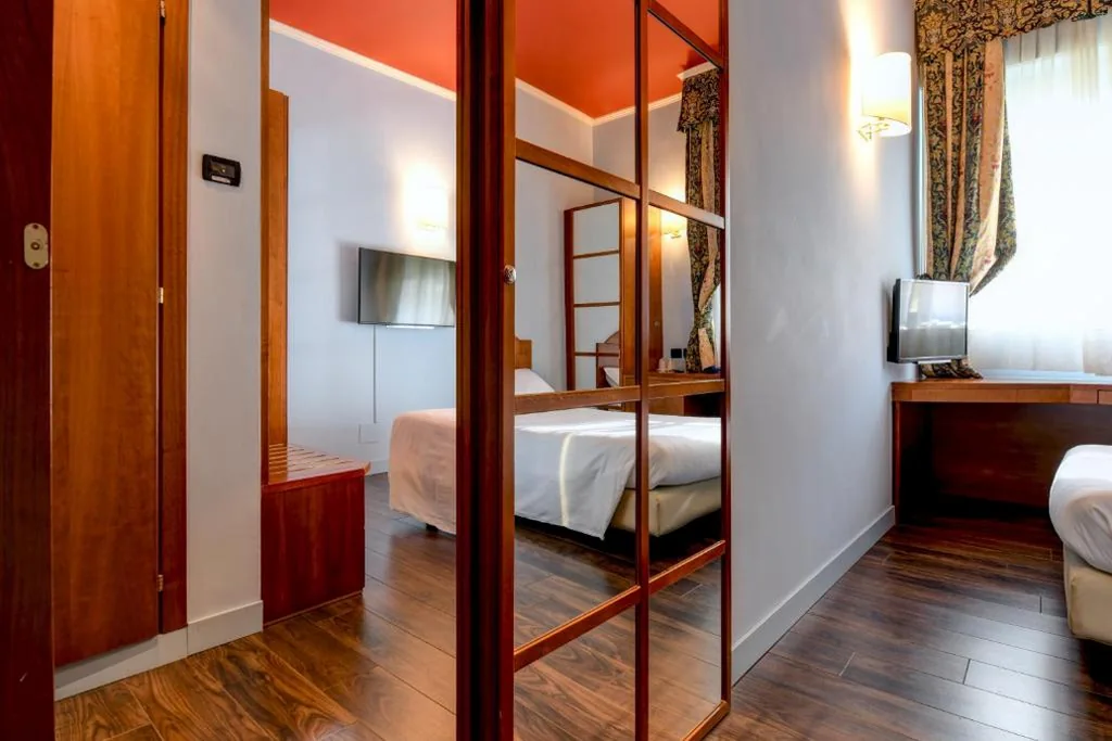 Classic Triple Room — Hotel City