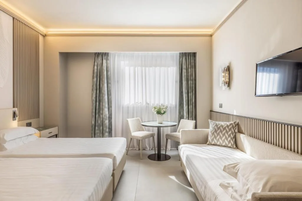 Comfort Triple Room — Abacus Hotel
