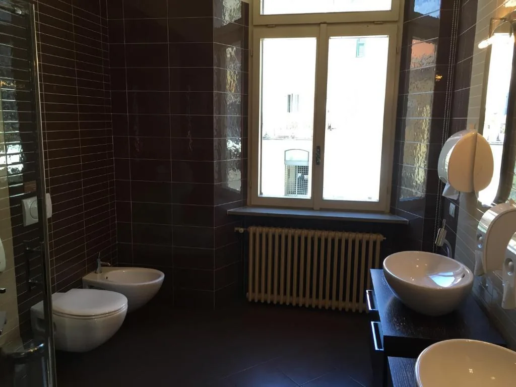Triple Room with Shared Bathroom — Bergamo Center Rooms