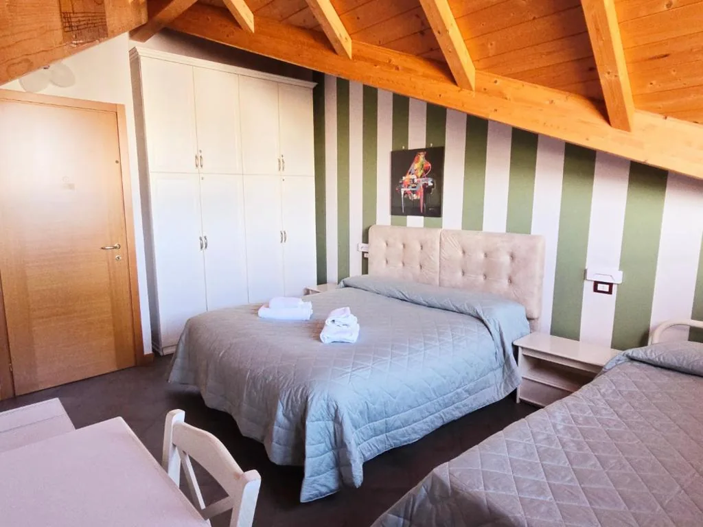Triple Room with Shared Bathroom — Made in Italy
