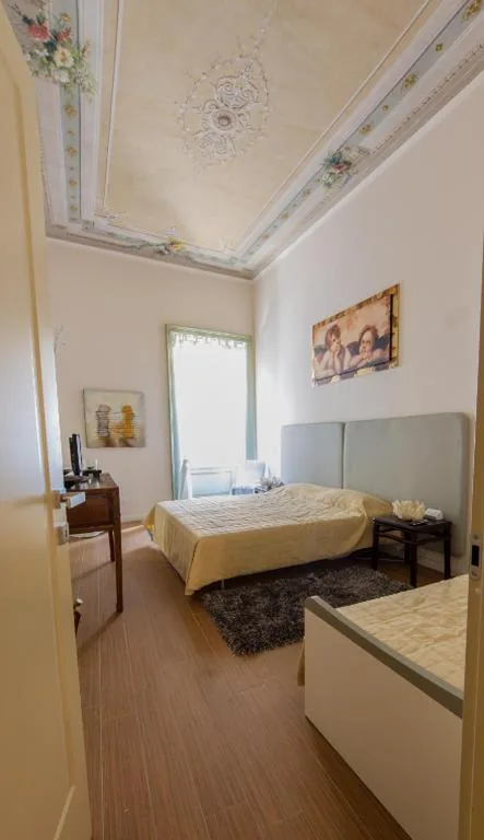 Triple Room with Shared Bathroom — Vip Bergamo Rooms