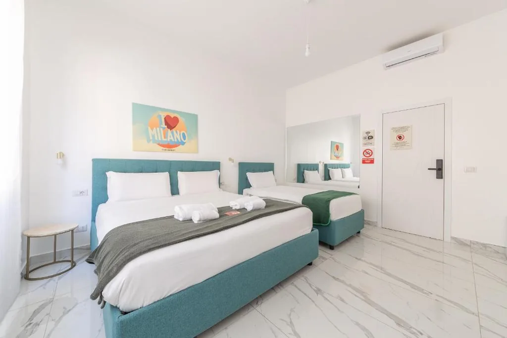 Triple Room with External Private Bathroom — Leia Hospitality