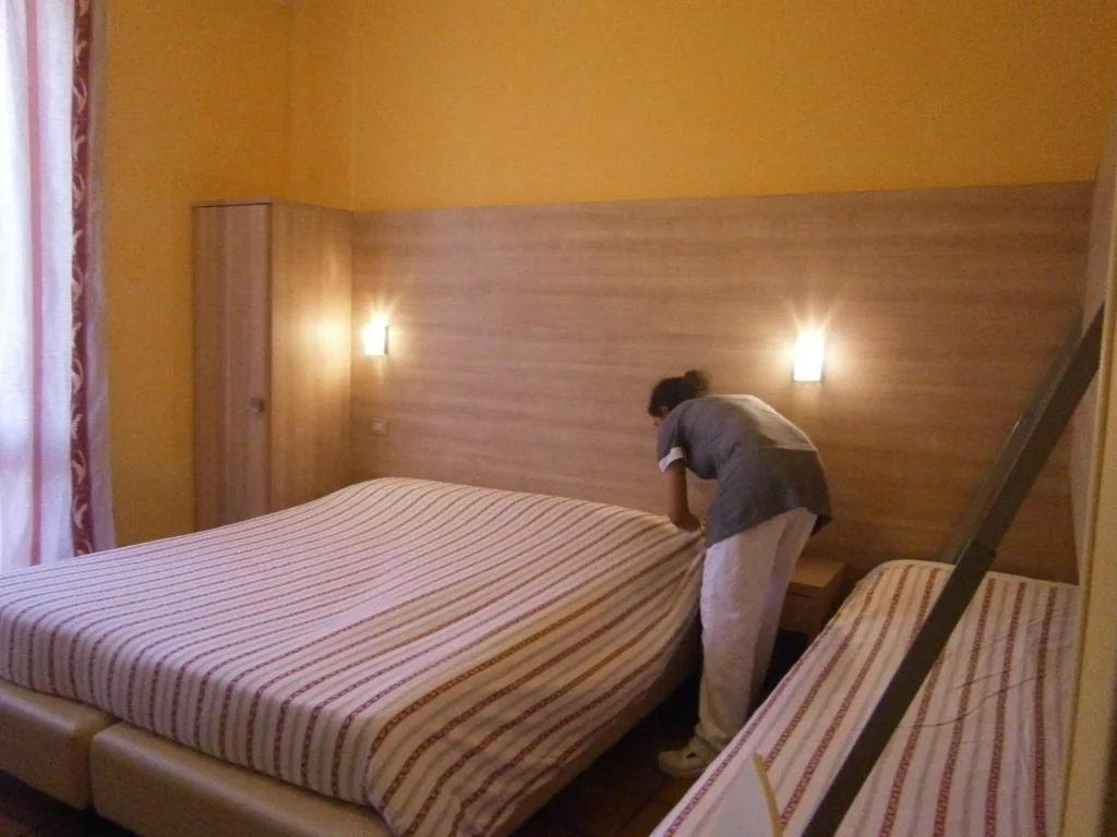 Triple Room with Balcony — Hotel Chiara