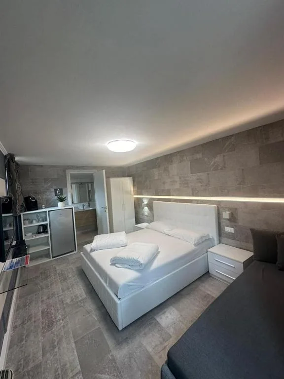 Triple Room with Terrace — Residence Delle Rose