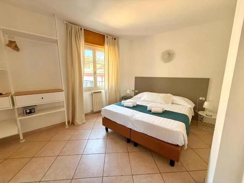 Triple Room with City View — Albergo Vittoria