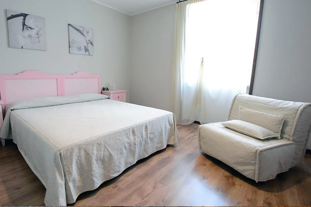 Triple Room with Lake View — Hotel Risi