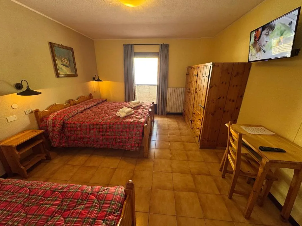 Triple Room with Mountain View — Hotel Genzianella