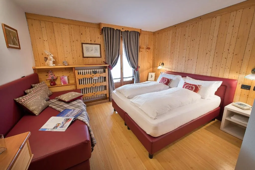 Triple Room with Mountain View — Hotel Posta