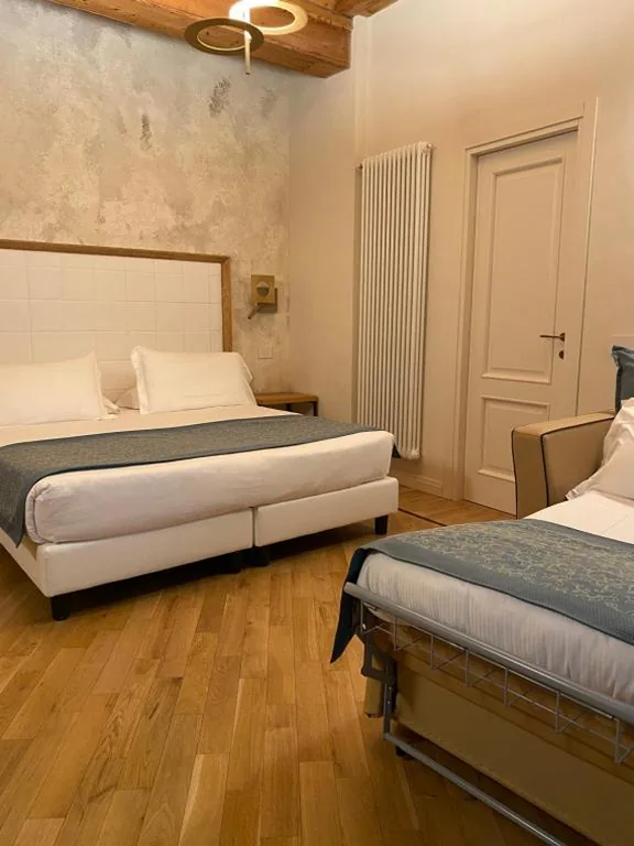 Deluxe Triple Room — Cà Uberti Palace Hotel, MantegnaHotels