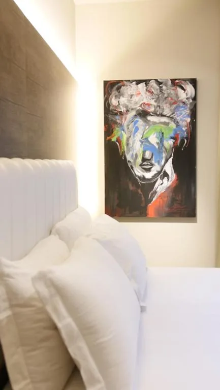 Deluxe Triple Room — Hotel Battisti 31