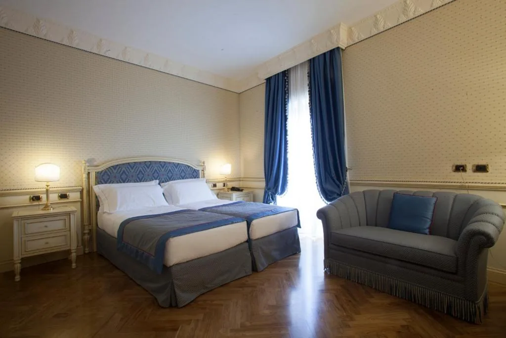 Deluxe Triple Room — Hotel Marconi
