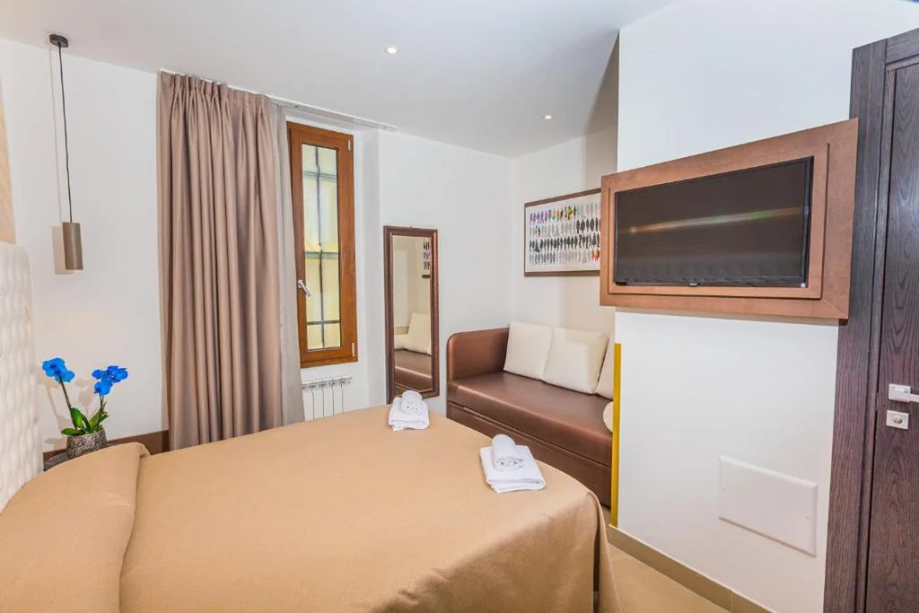 Deluxe Triple Room — Hotel Repubblica