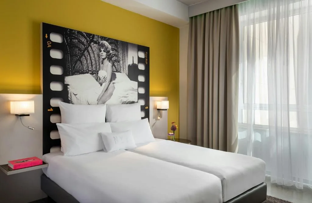Camera Tripla Deluxe — NYX Hotel Milan by Leonardo Hotels