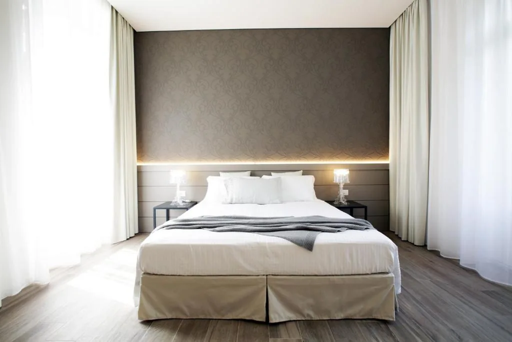 Deluxe Triple Room — Villa Liberty