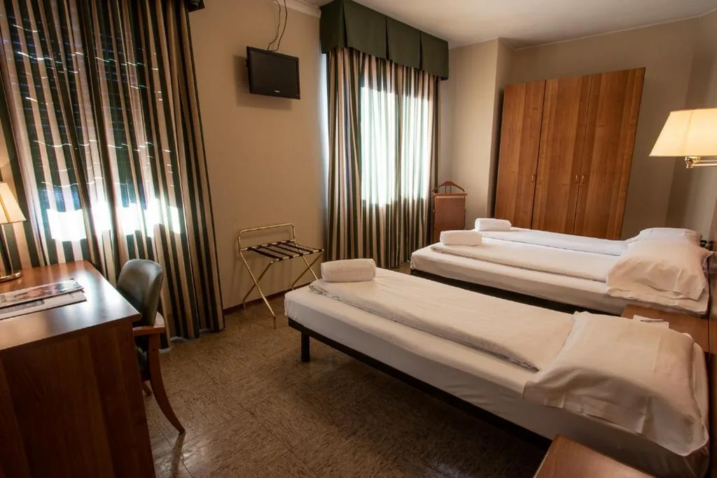 Economy Triple Room — Hotel Corona