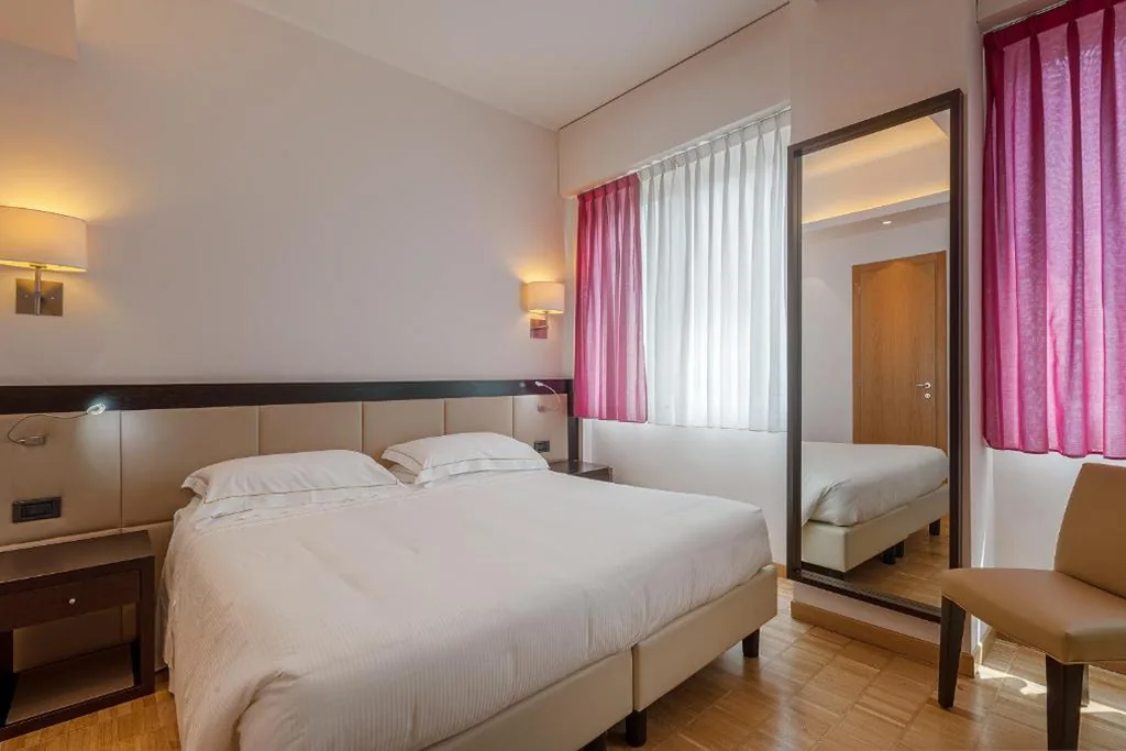 Triple Room — Hotel Ariston