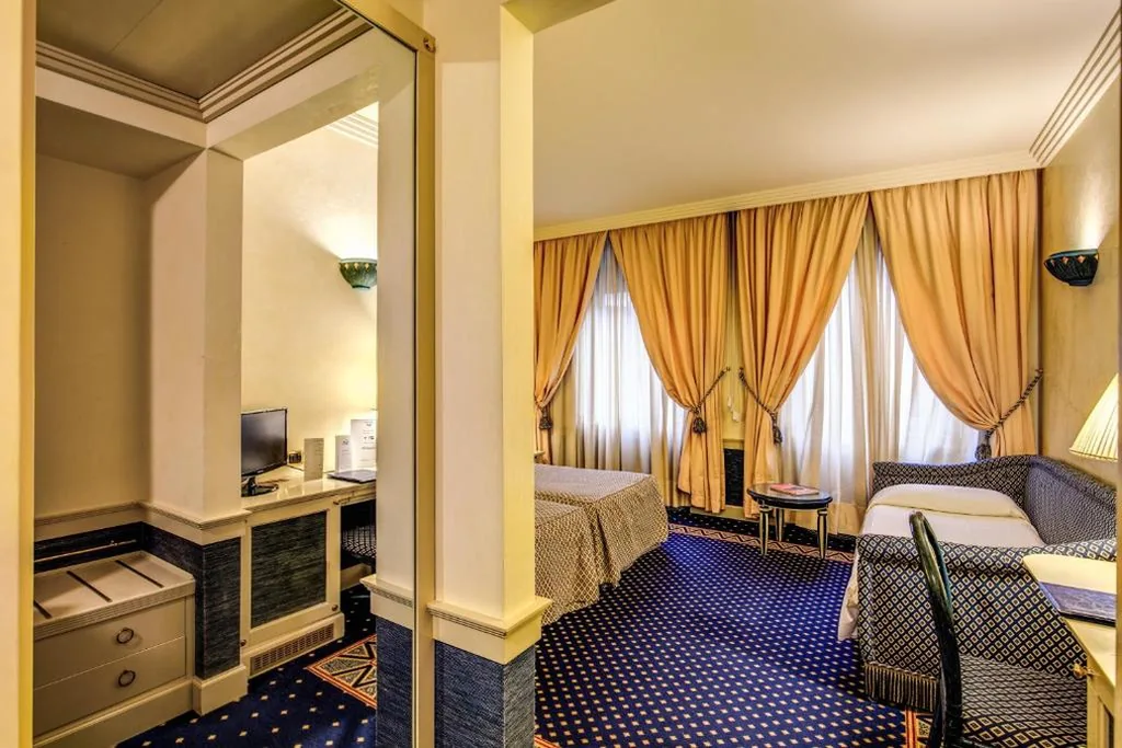 Triple Room — Hotel Auriga