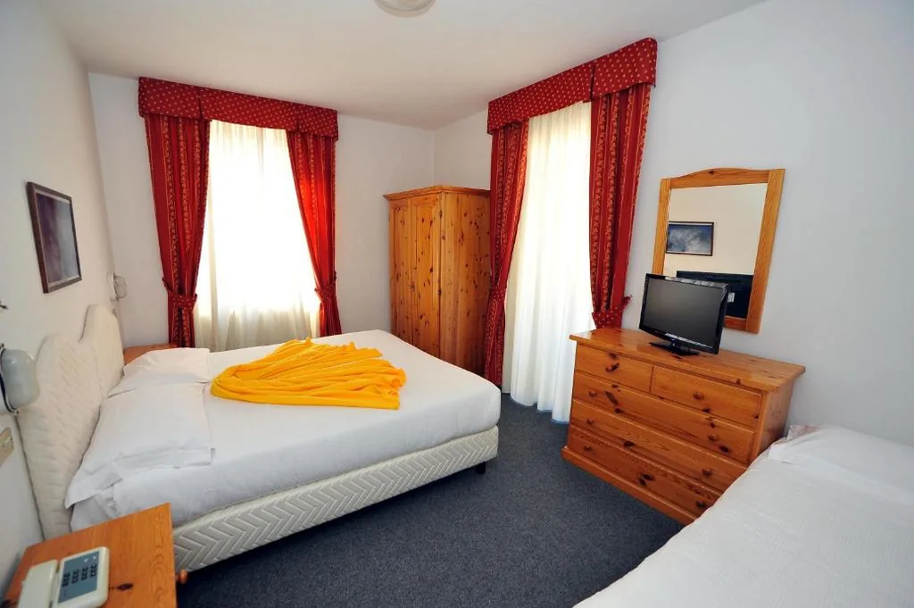 Triple Room — Hotel Capitani