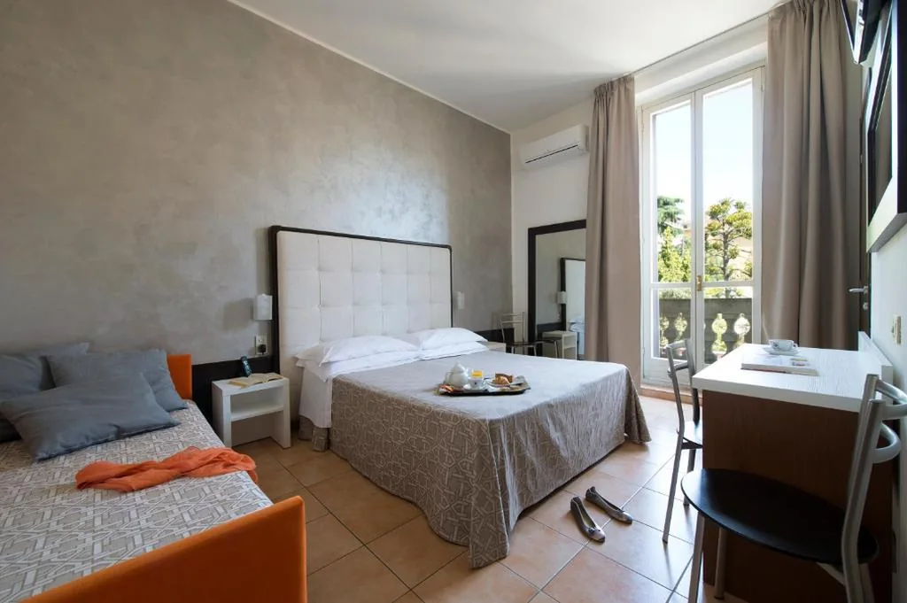 Triple Room — Hotel Delizia