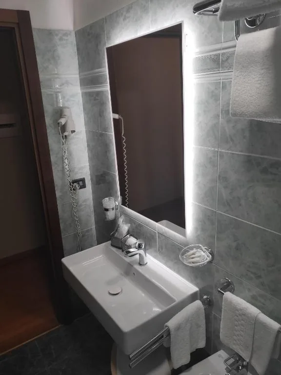 Triple Room — Hotel La Vignetta