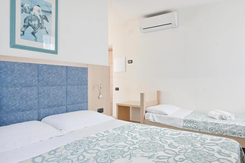 Triple Room — Hotel Marco’s