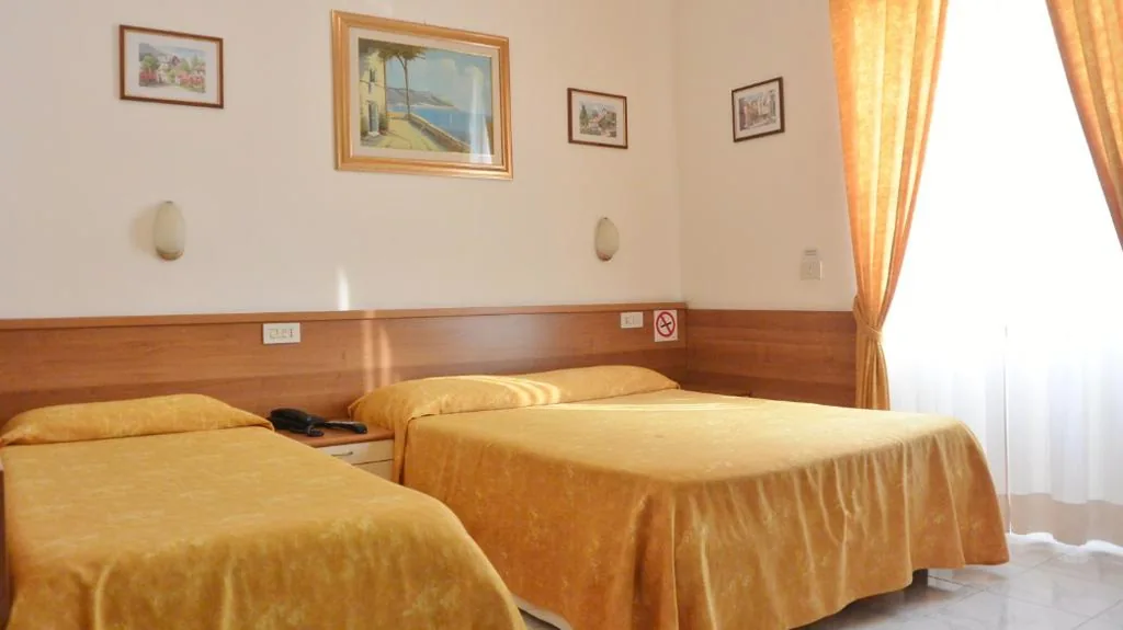 Triple Room — Hotel Mignon