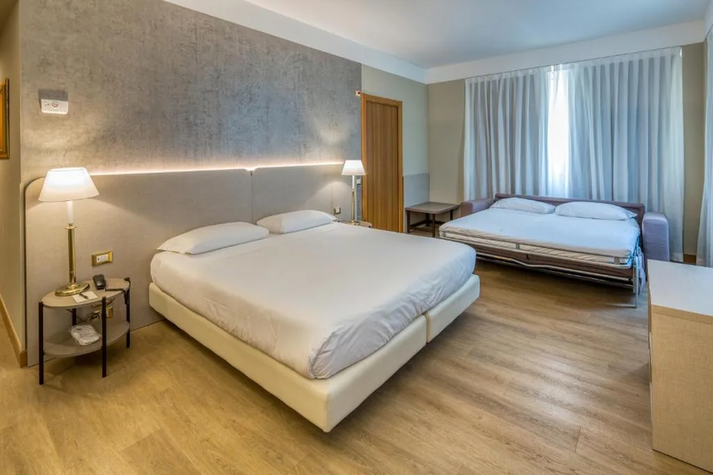 Triple Room — Hotel Nasco