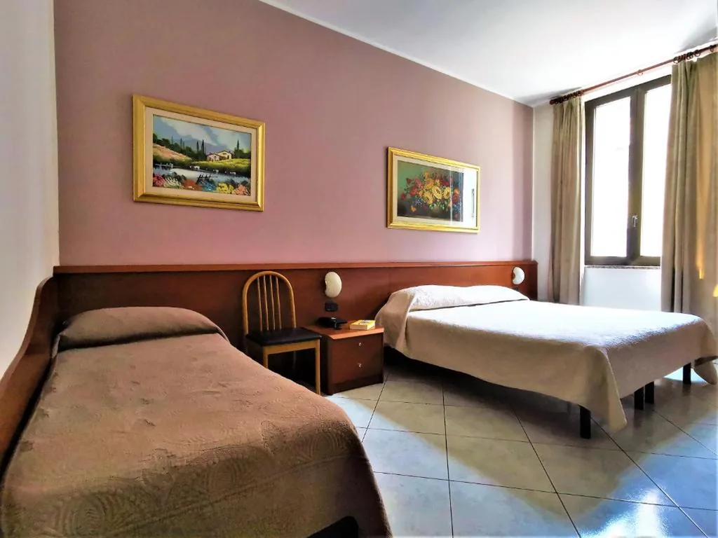 Triple Room — Hotel Venini