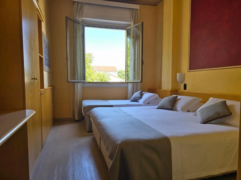 Triple Room — Mokinba Hotels Sant’Ambroeus