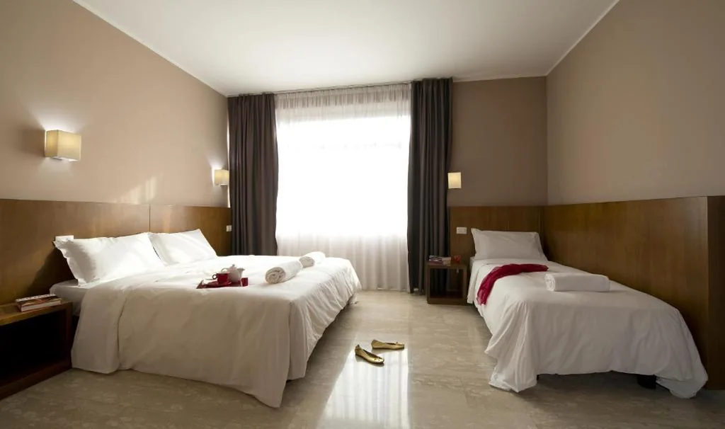 Triple Room — Oasi Village Hotel