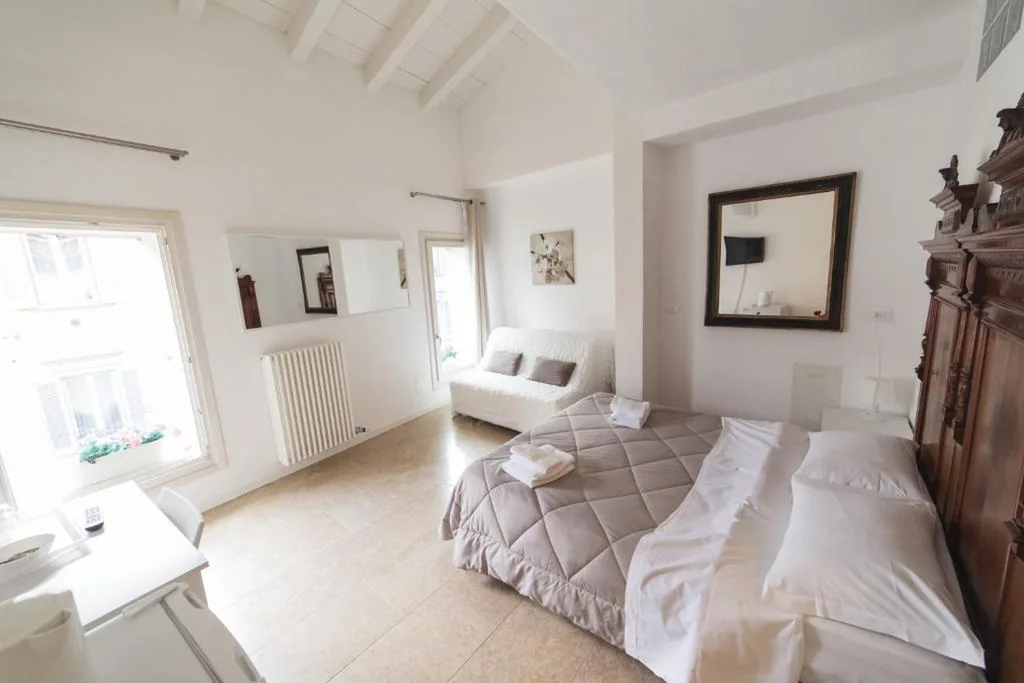 Standard Triple Room — Academia Resort