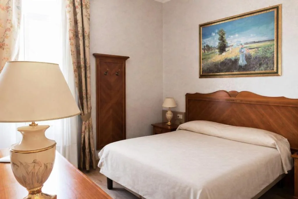 Camera Tripla Standard — Hotel Maderno by Double Hospitality