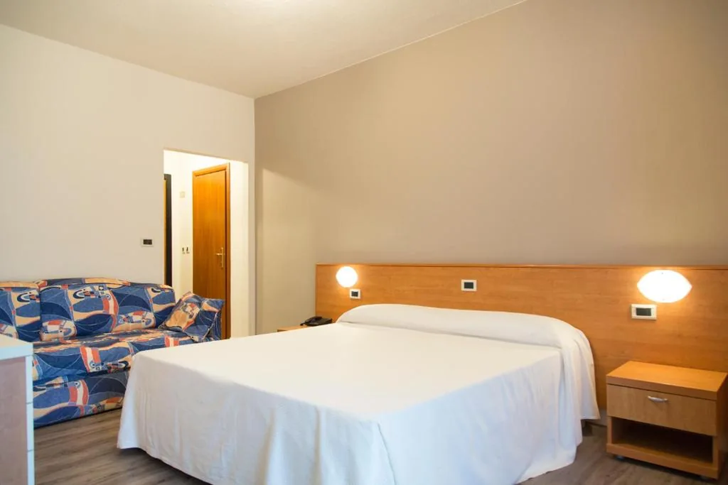 Standard Triple Room — Hotel Royal Village