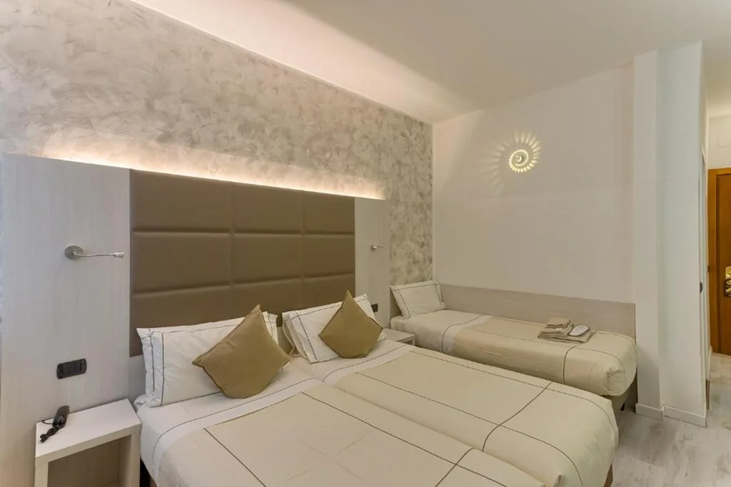 Superior Triple Room — Agape Hotel – AA Hotels