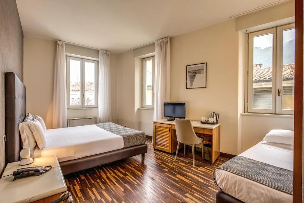 Camera Tripla Superior — Albergo Firenze