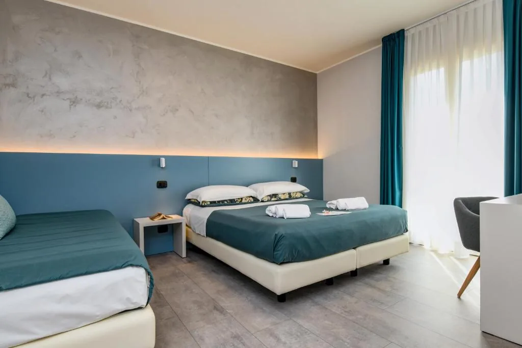 Superior Triple Room — Garda Diamant