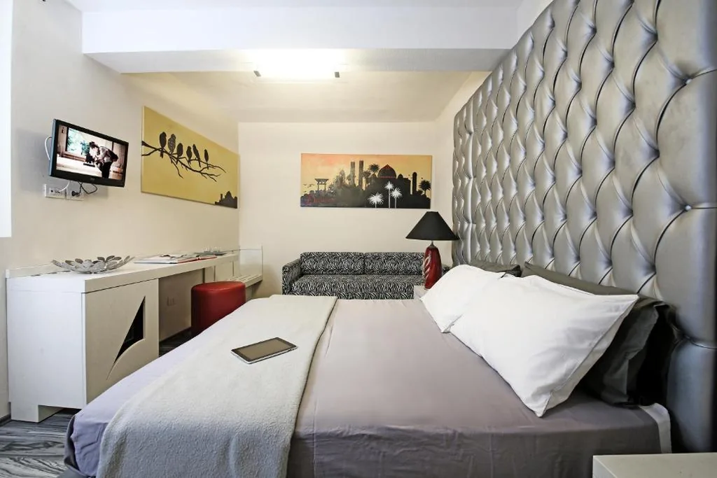 Superior Triple Room — Happy Hotel Atelier Gardone Vittoriale