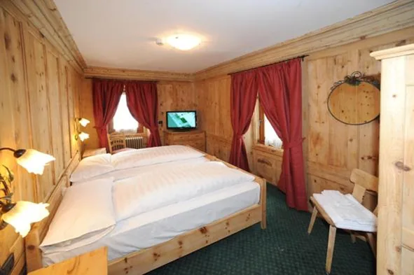 Superior Triple Room — Hotel Alpina